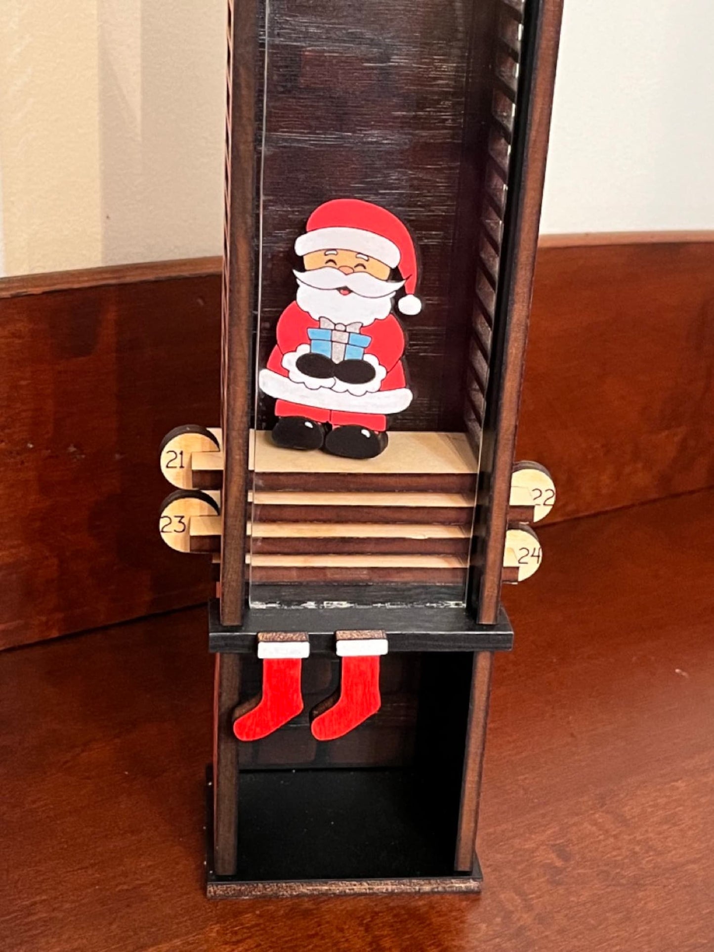 Santa Claus down the chimney countdown advent calendar