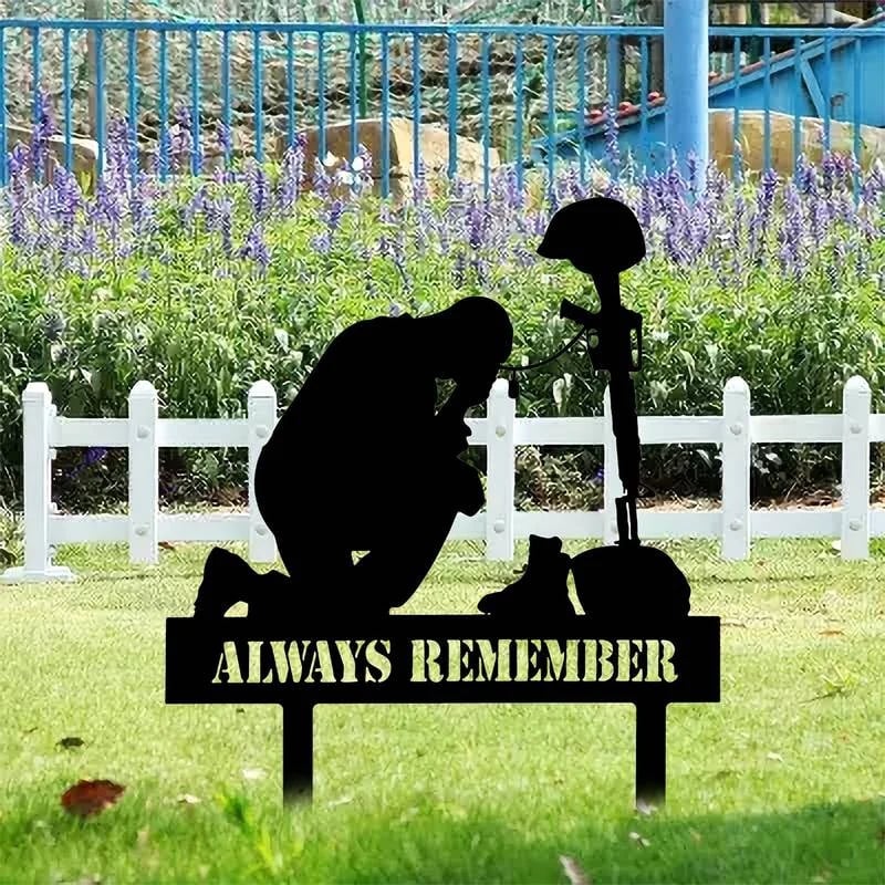 Memorial metal plaque for fallen soldiers, yard