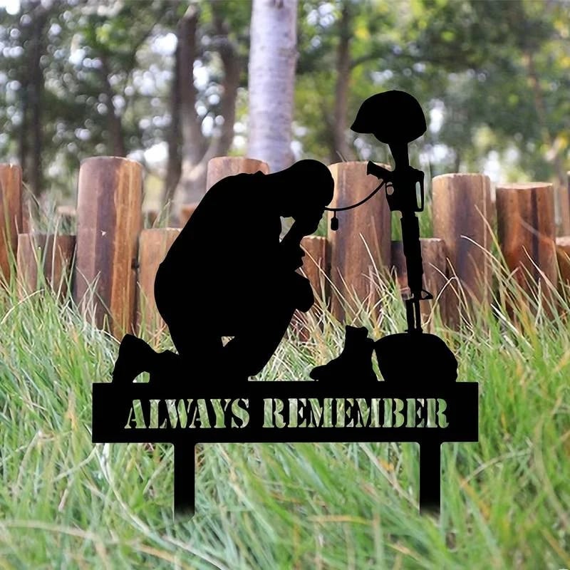 Memorial metal plaque for fallen soldiers, yard
